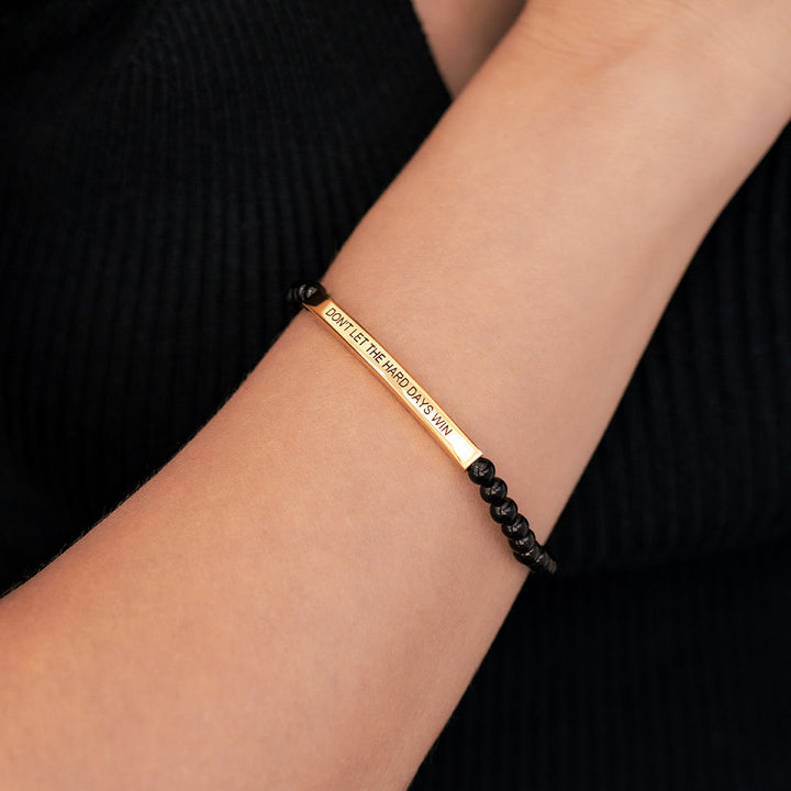 Bracciale ispiratore con perline "Non lasciare che i giorni difficili vincano"