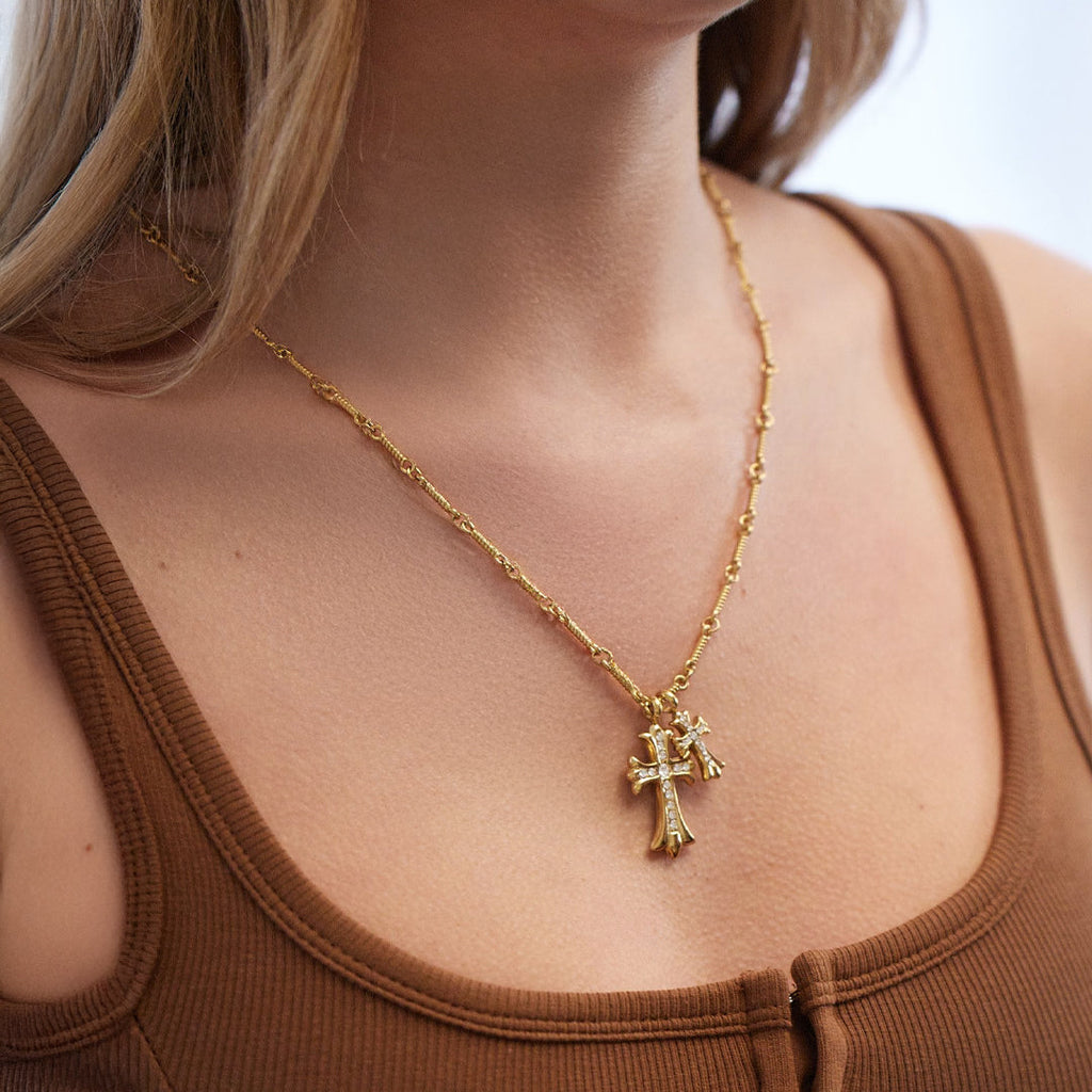 Collar con colgante de doble cruz