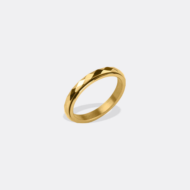 Delikāts kaltēts gredzens ar rotējošu fidget elementu