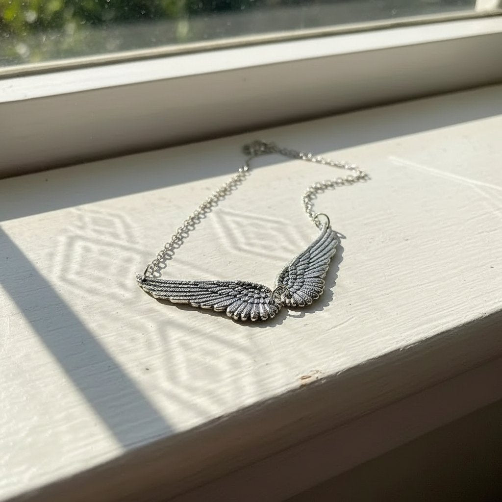 Collier Aile Statement