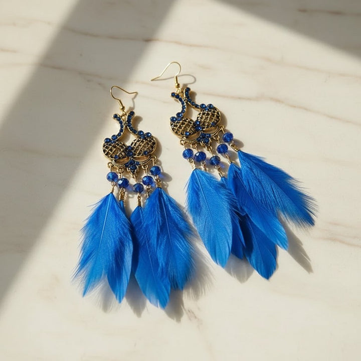 Boucles d'oreilles plumes bleues bohèmes