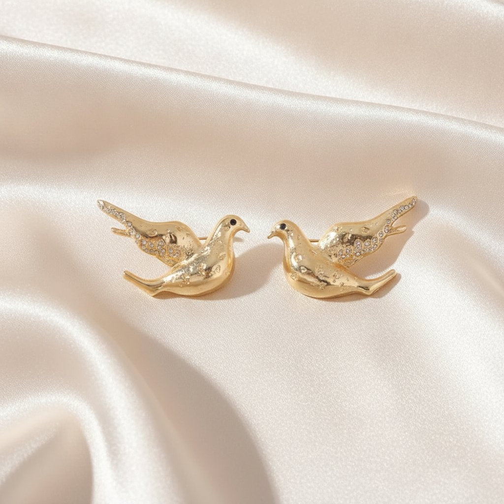 Boucles d'oreilles colombe en or