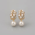 Pendientes elegantes con perlas hermosas