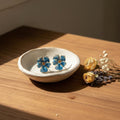 Orecchini a fiore blu