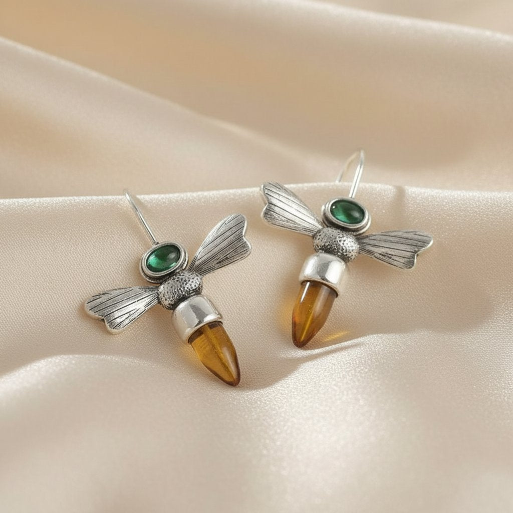 Zaļojošā čuksta bišu elegances piliens auskari