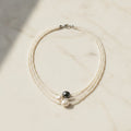 Une Pearl Necklace