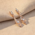 Boucles d'oreilles vintage pendantes fleur en or rose