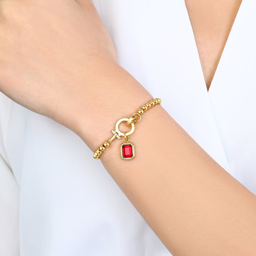 Mintkleurige kralenarmband met baguette geboortesteenbedel