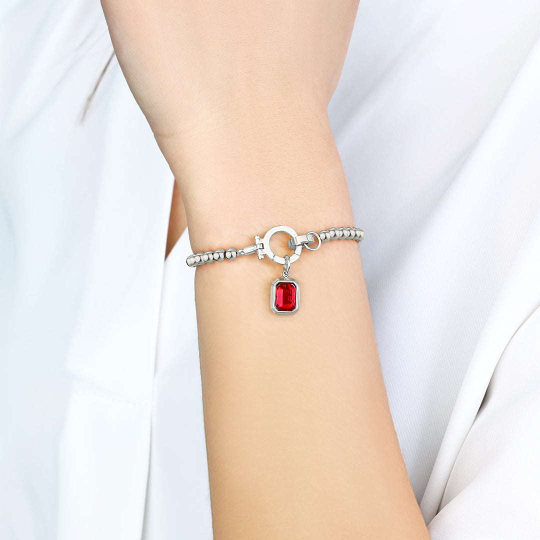Mintkleurige kralenarmband met baguette geboortesteenbedel