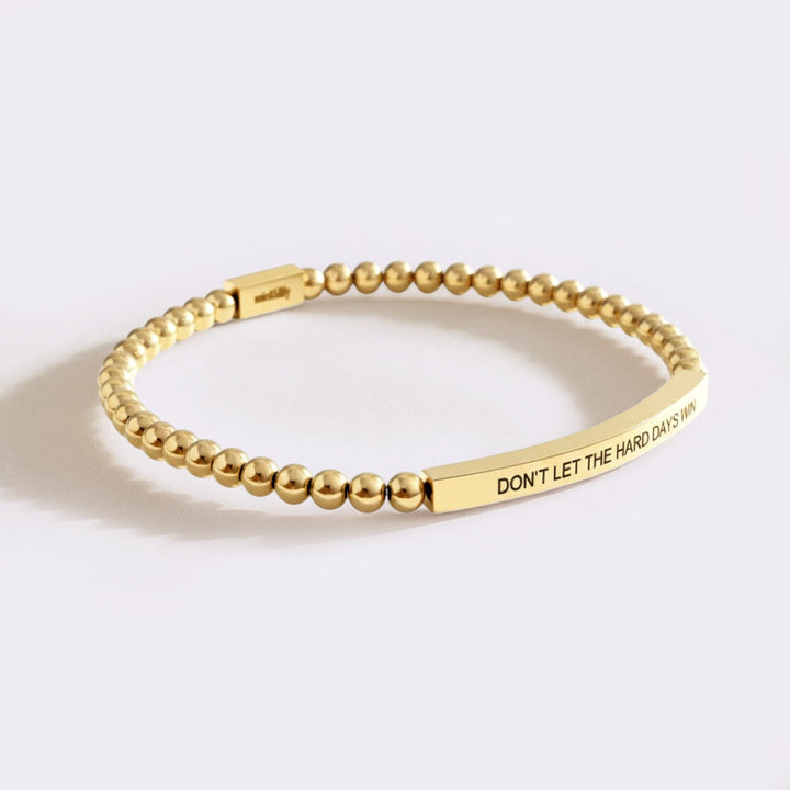Bracciale ispiratore con perline "Non lasciare che i giorni difficili vincano"