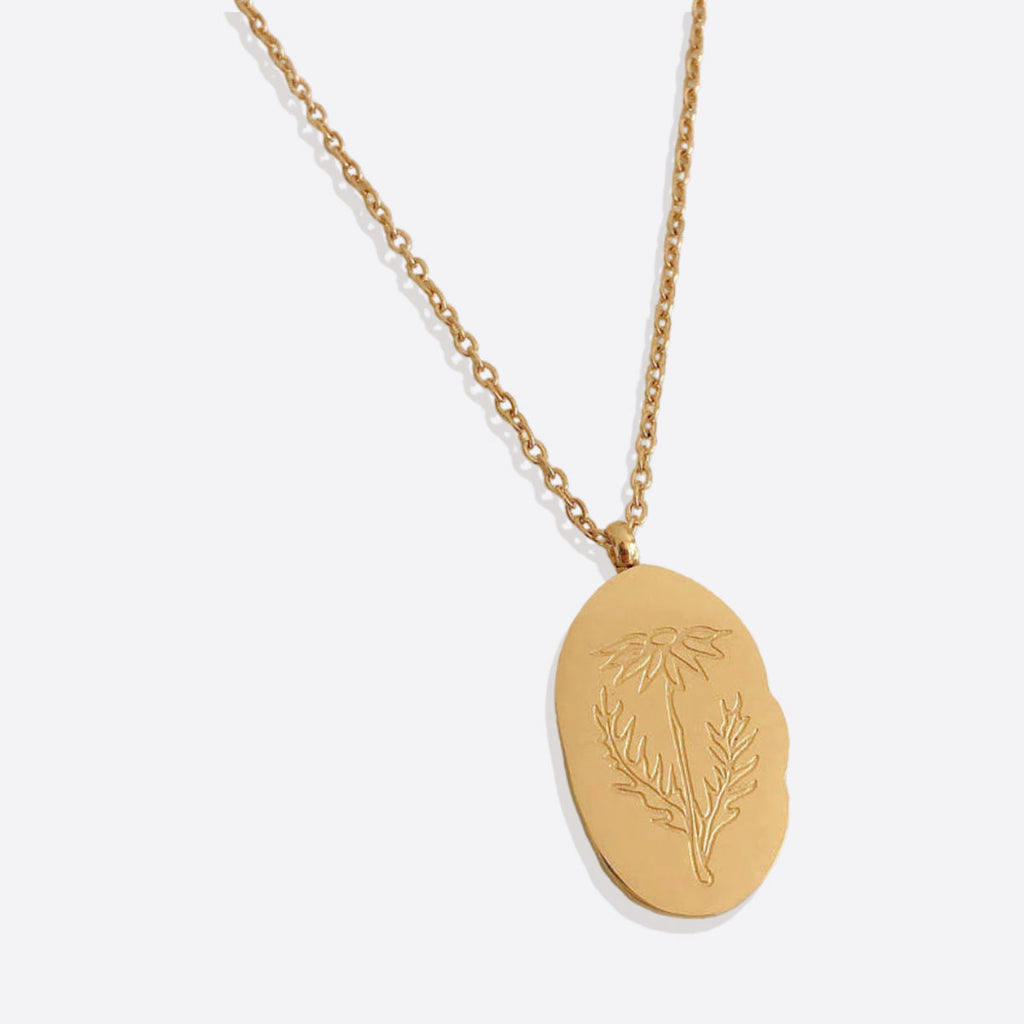 Halsband med hängsmycke i guld och födelseblomma