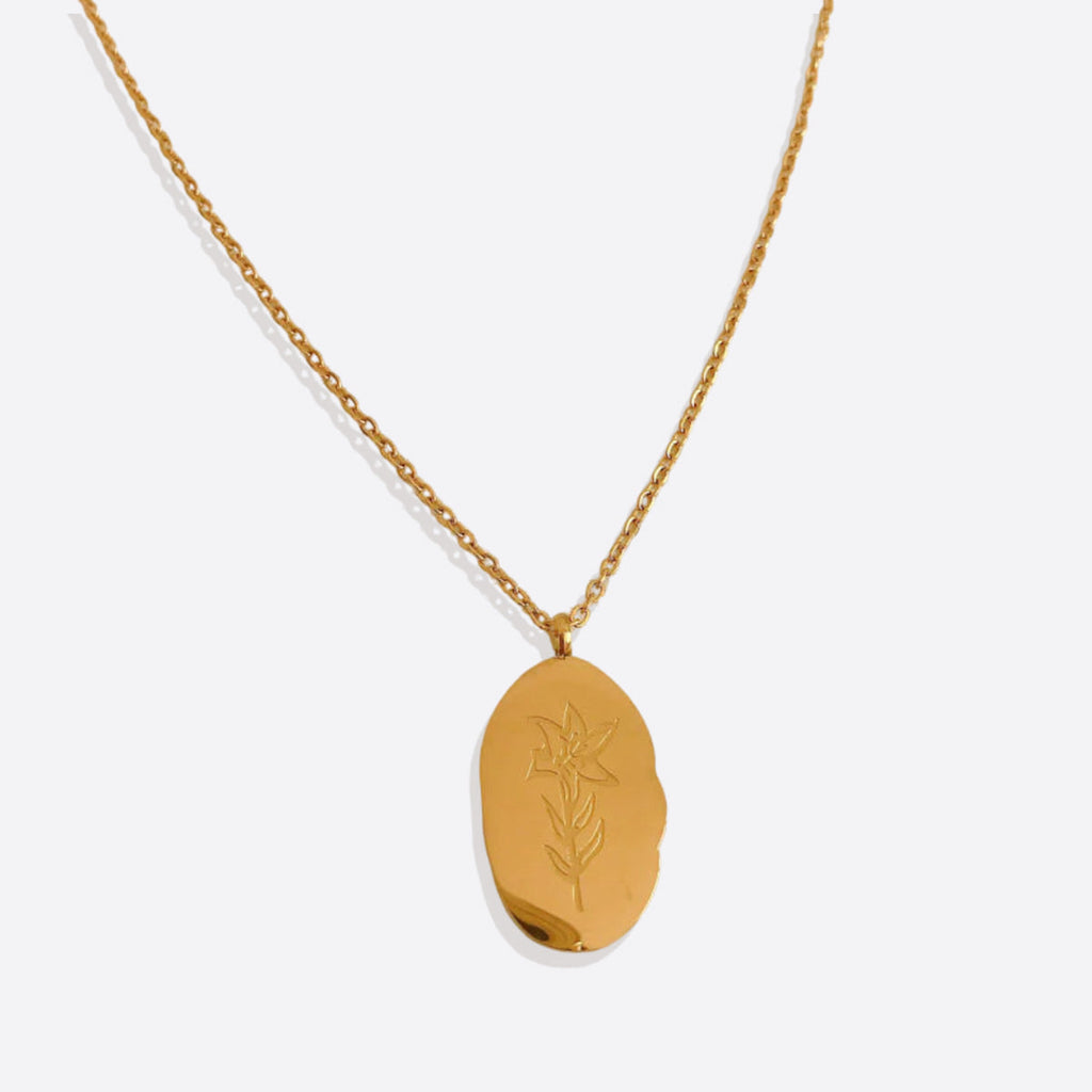 Halsband med hängsmycke i guld och födelseblomma
