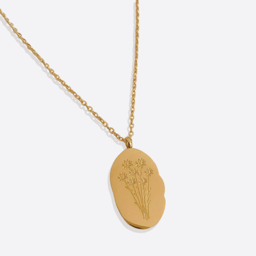 Halsband med hängsmycke i guld och födelseblomma