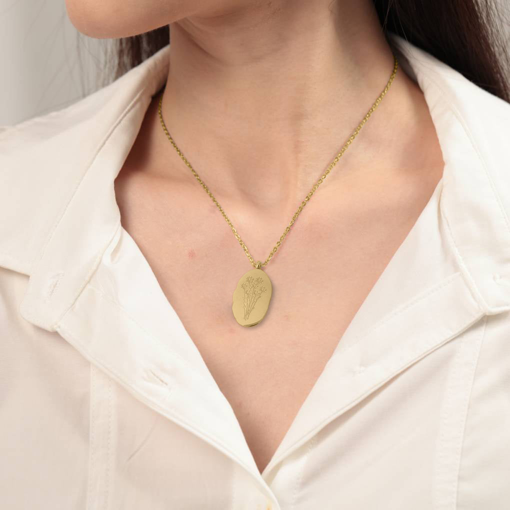 Halsband med hängsmycke i guld och födelseblomma