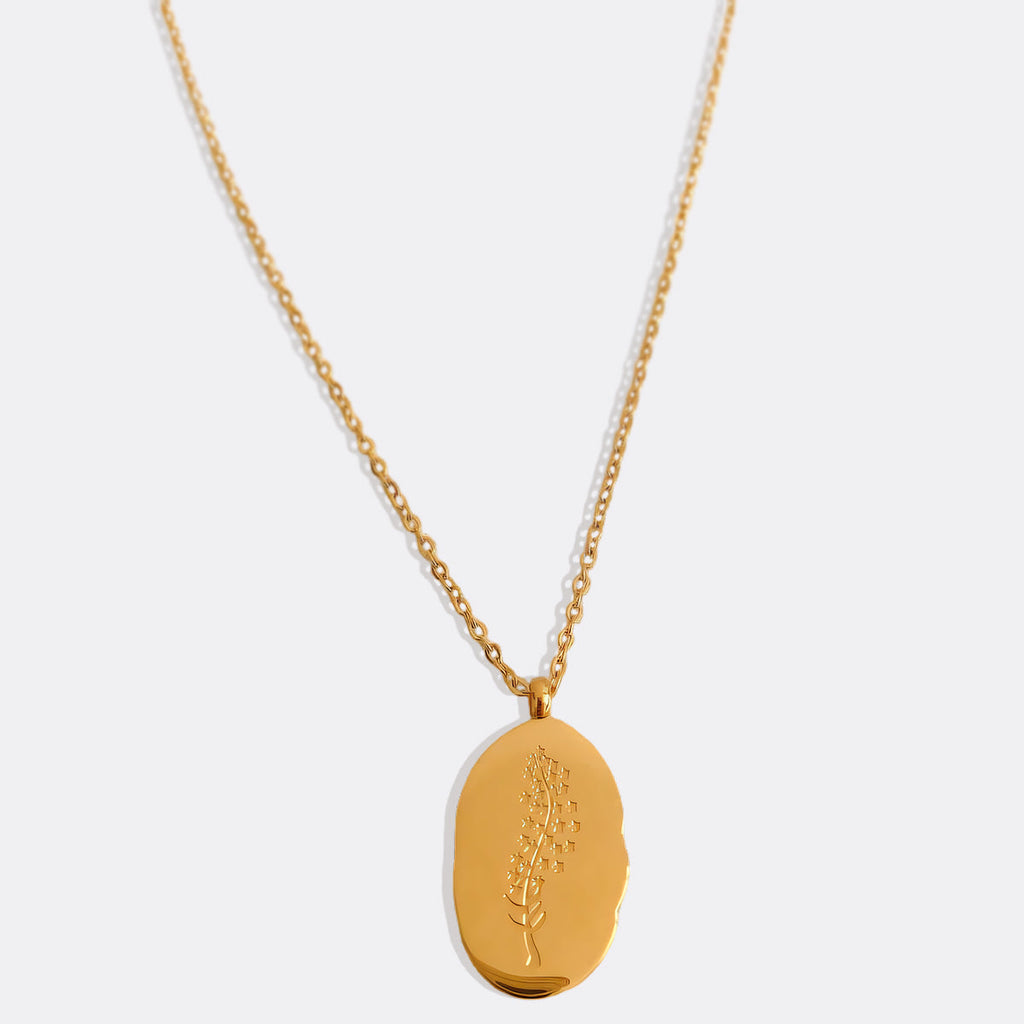 Halsband med hängsmycke i guld och födelseblomma