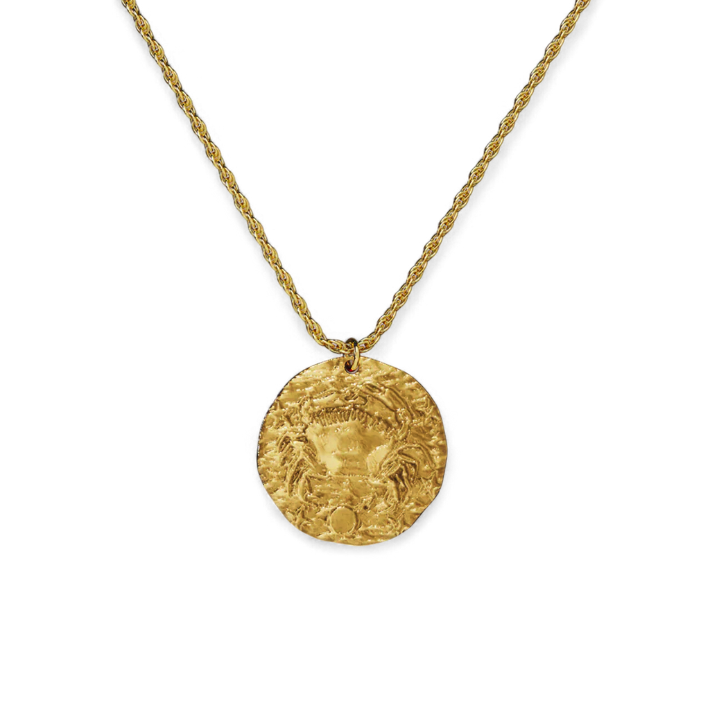 Collana con ciondolo zodiacale in oro martellato
