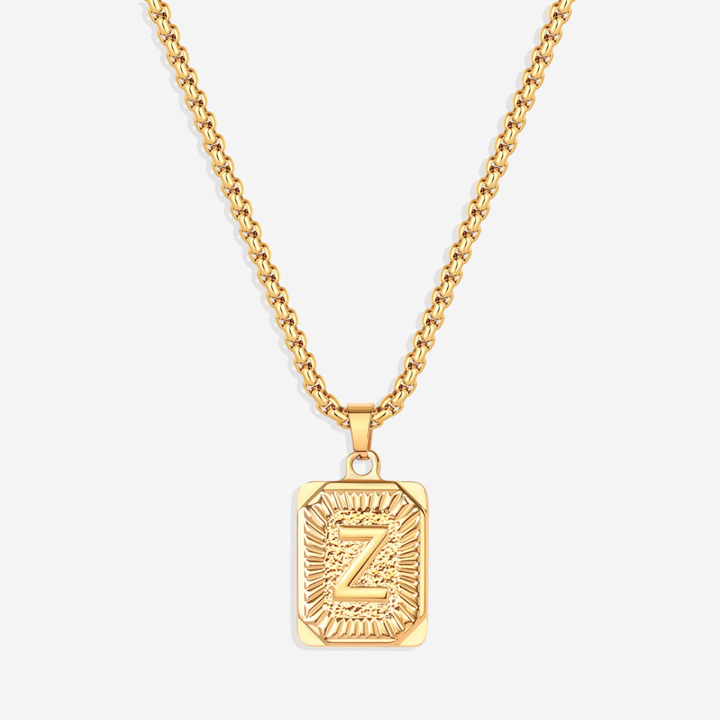 Halsband med initialbricka och rolo-kedja