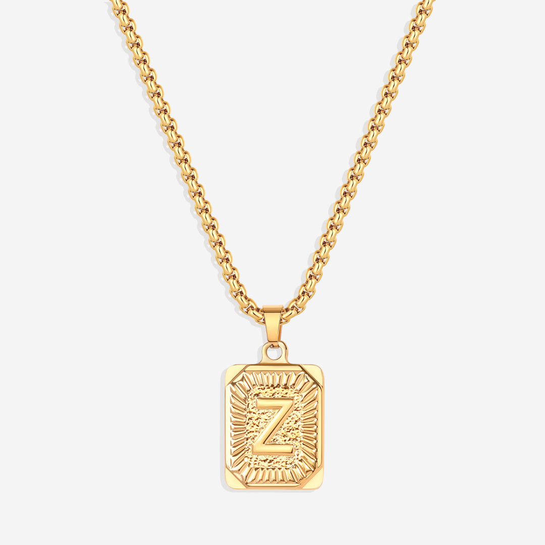 Halsband med initialbricka och rolo-kedja