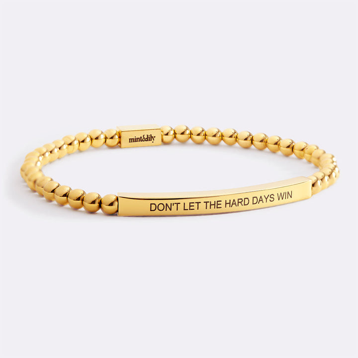Bracciale ispiratore con perline "Non lasciare che i giorni difficili vincano"