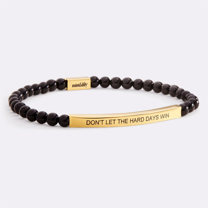 Bracciale ispiratore con perline "Non lasciare che i giorni difficili vincano"