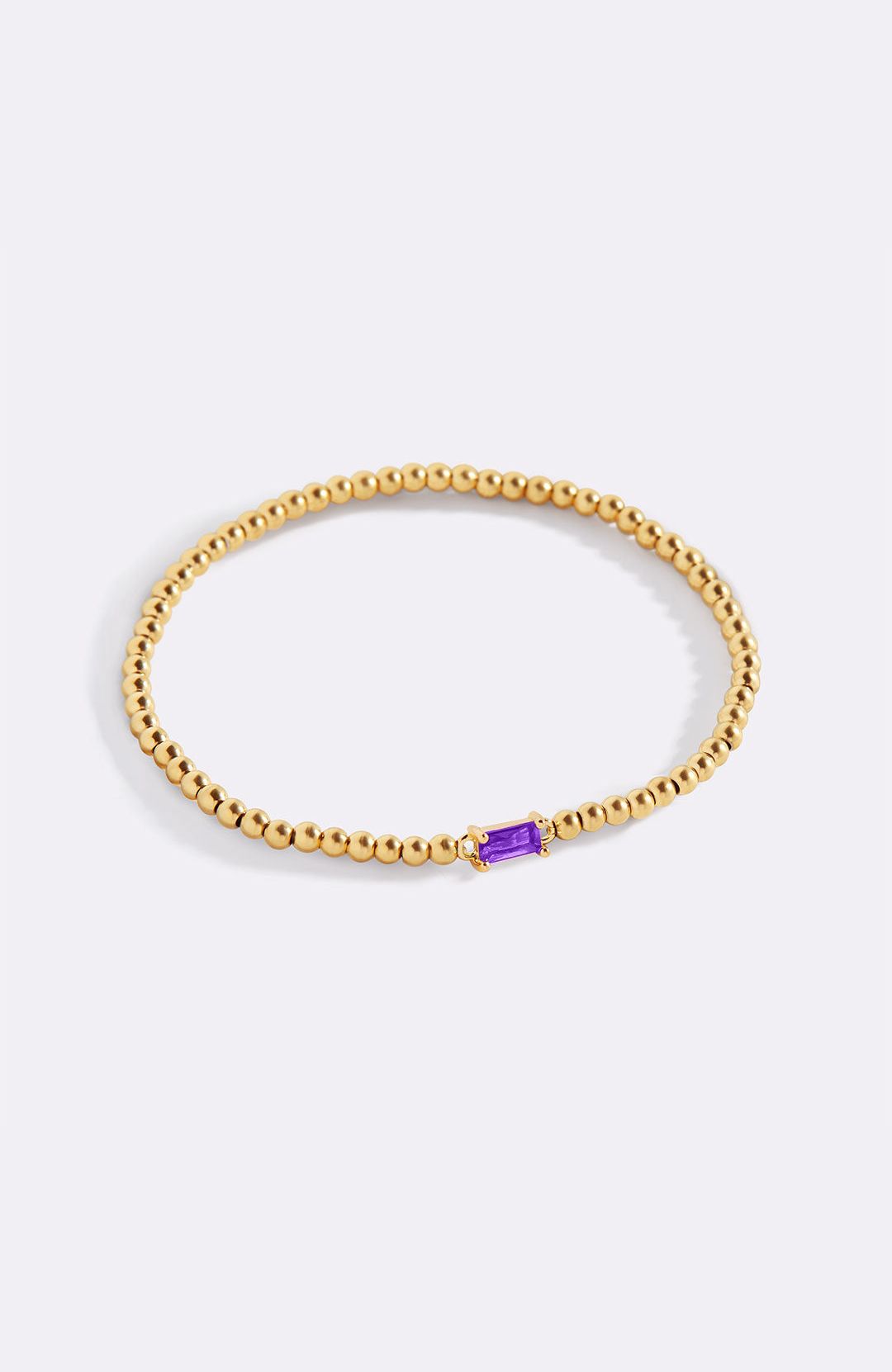 Guldarmband med pärlor och födelsesten