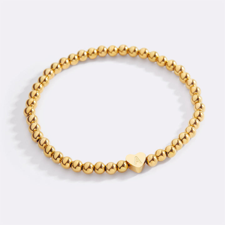 Gold Beaded Bracelet with Heart Initial