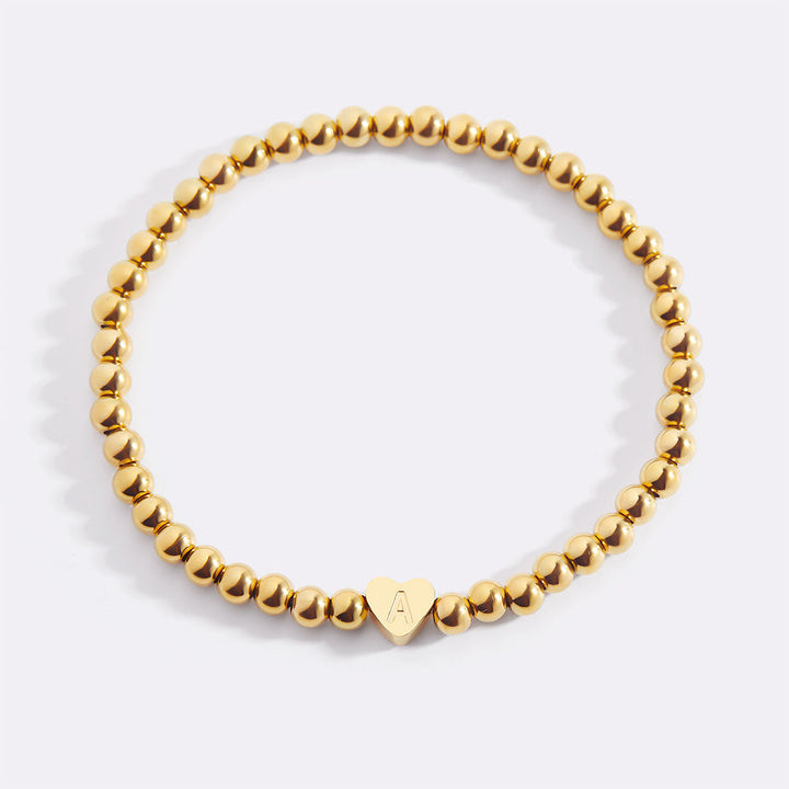 Gold Beaded Bracelet with Heart Initial