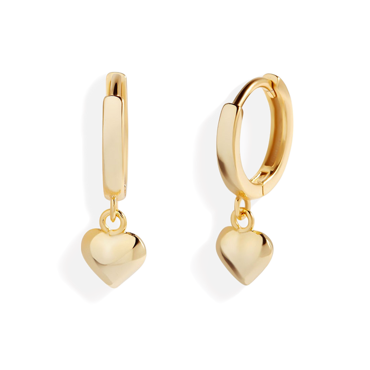 Delikate hjerte-øredobber med ringdesign