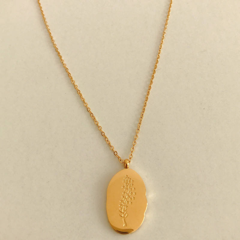 Halsband med hängsmycke i guld och födelseblomma
