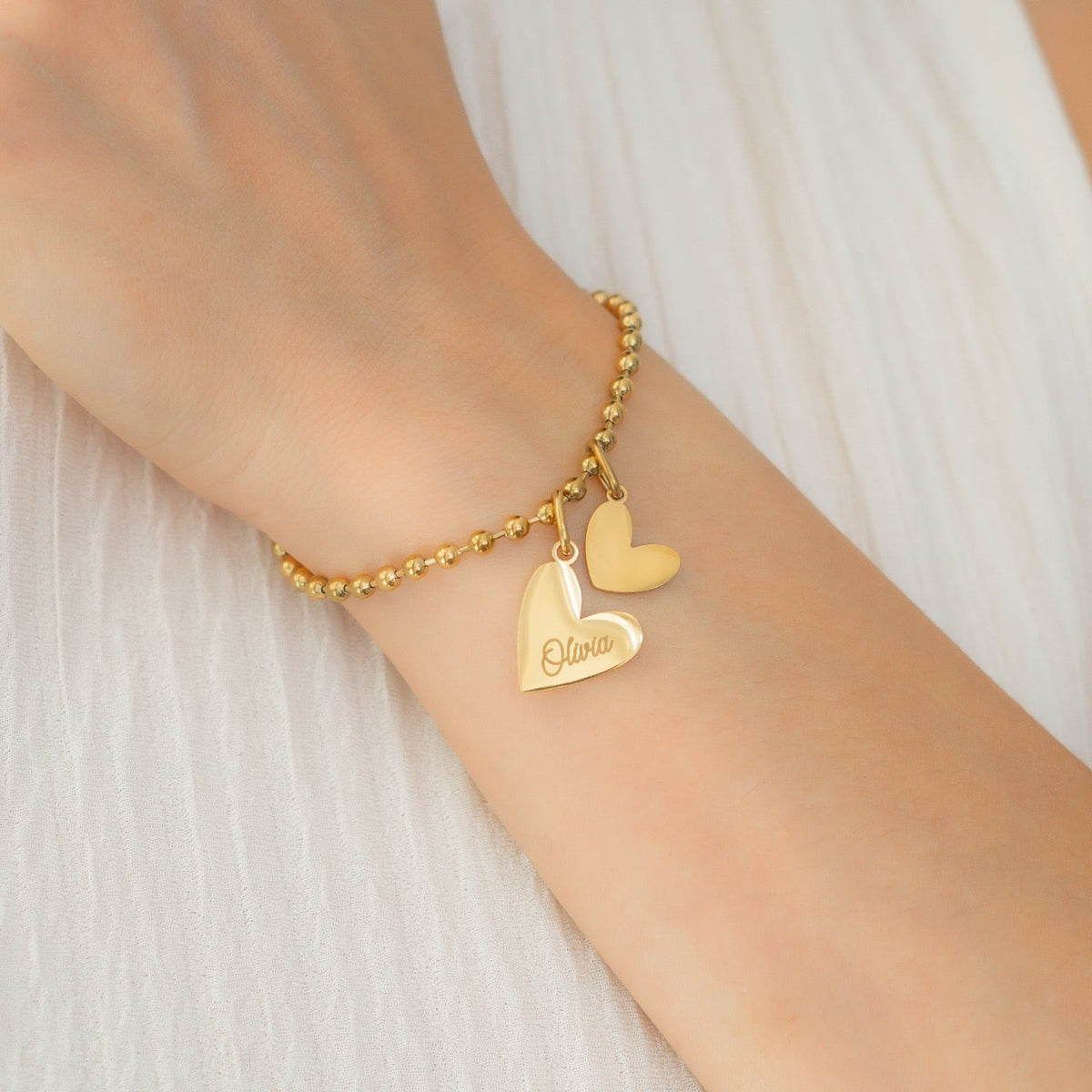 Bracelet à breloques double cœur perlé personnalisé