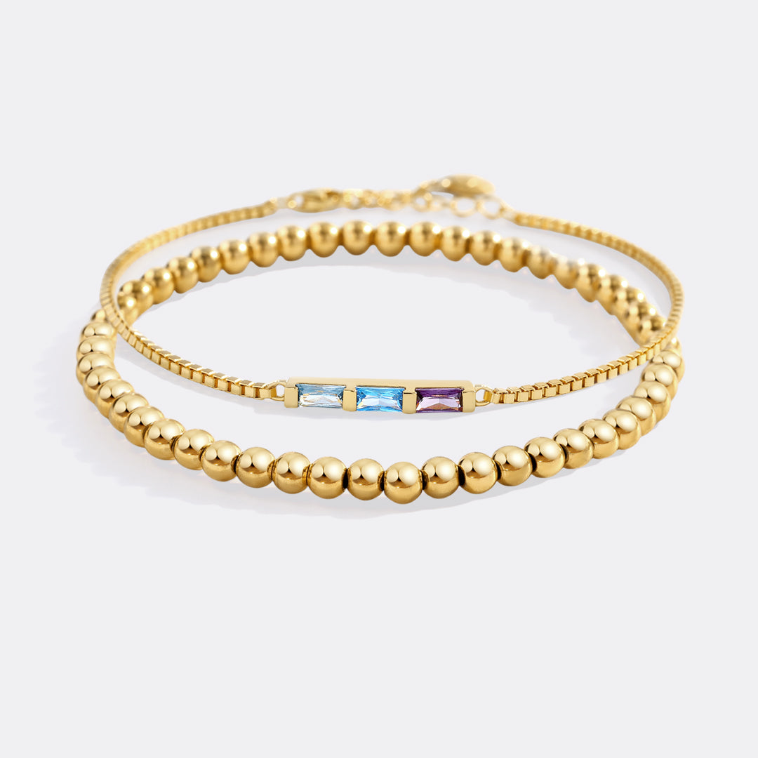 Set di bracciali sottili con pietra di nascita baguette e bracciale impilabile con perline