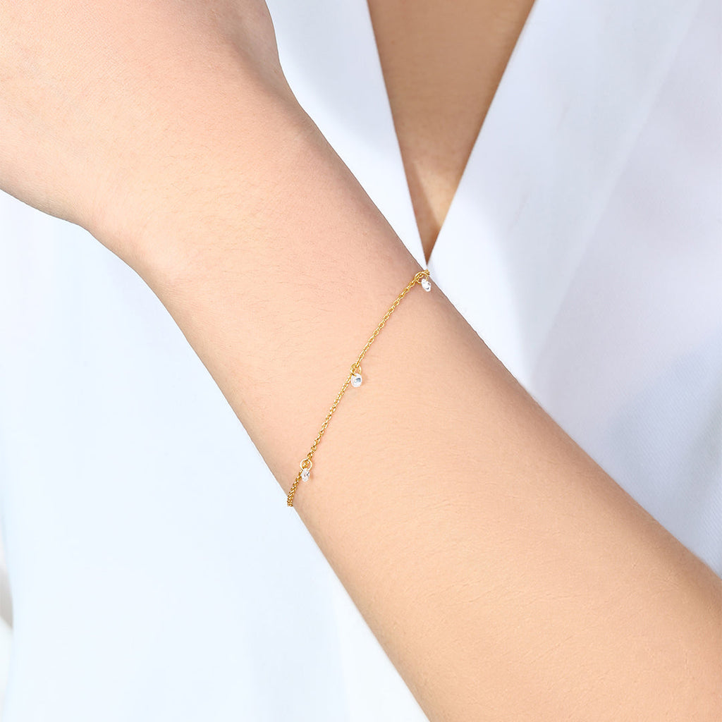 Delikat diamantstationsarmband