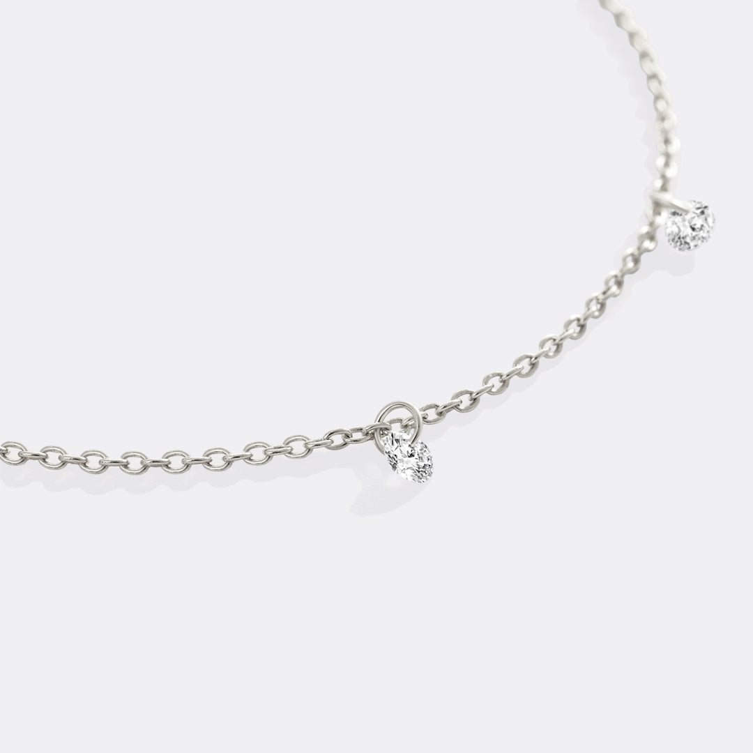 Delikat diamantstationsarmband