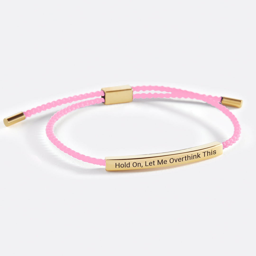 Vent lige, lad mig overtænke dette Inspire-armbånd