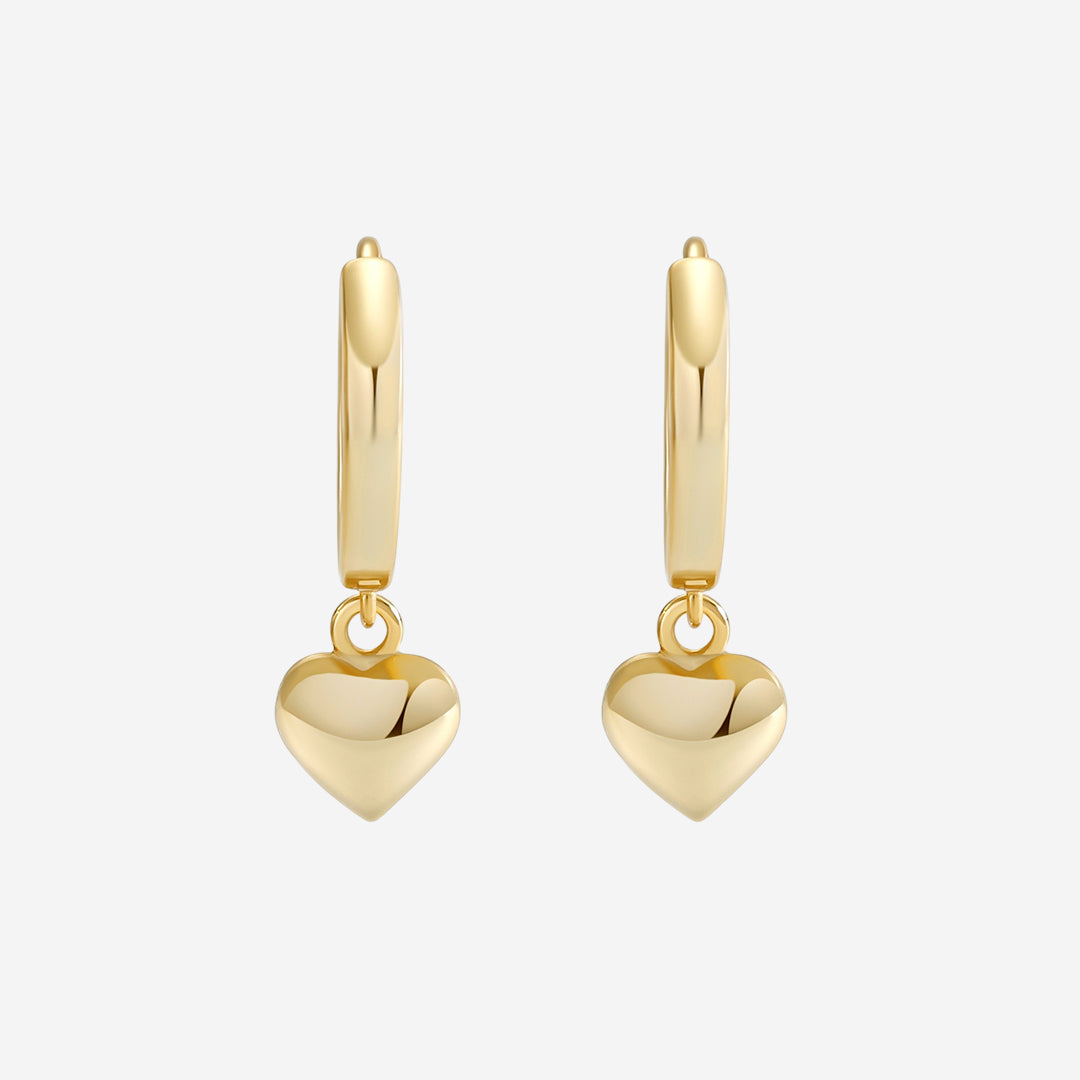 Delikate hjerte-øredobber med ringdesign