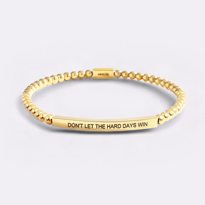 Bracciale ispiratore con perline "Non lasciare che i giorni difficili vincano"