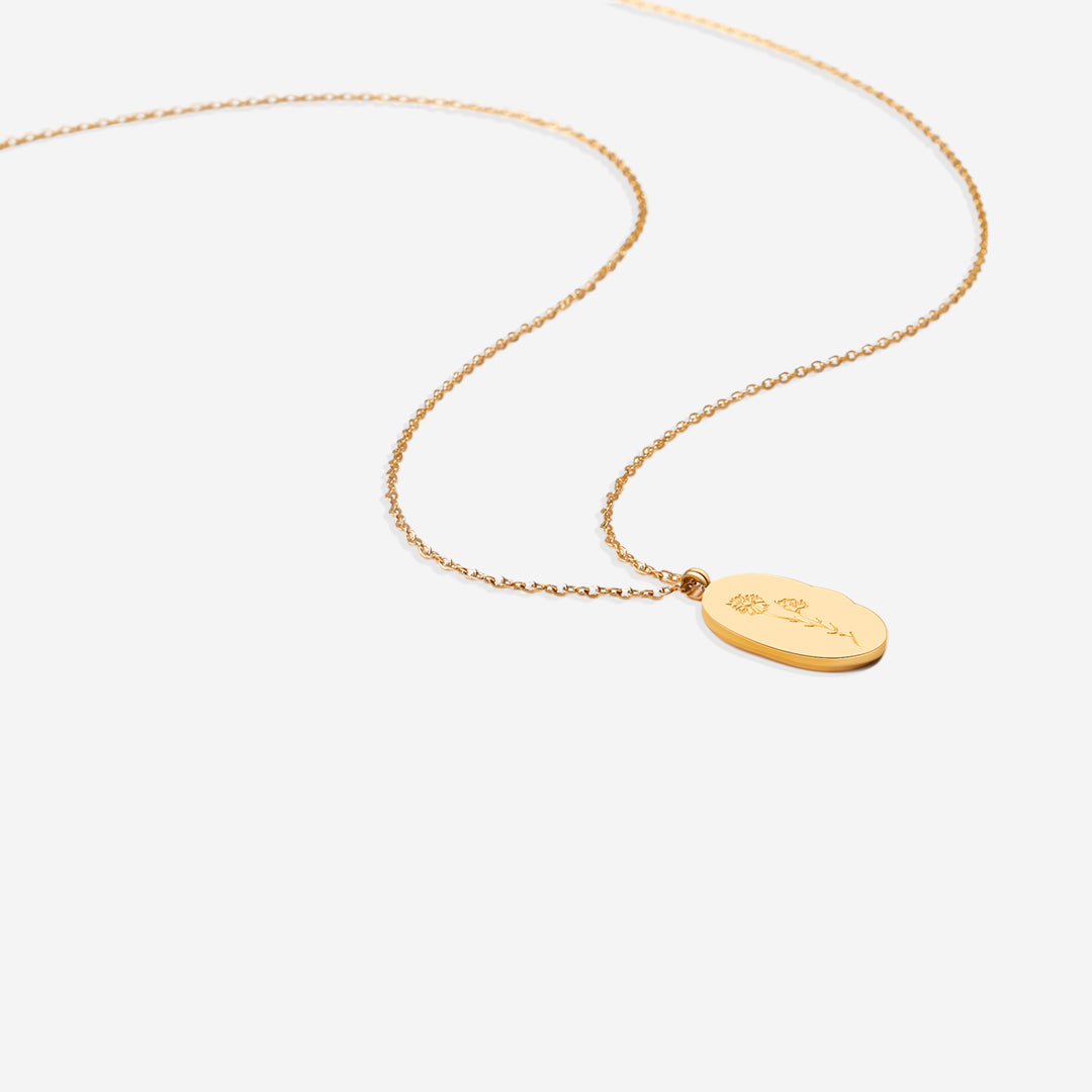 Halsband med hängsmycke i guld och födelseblomma