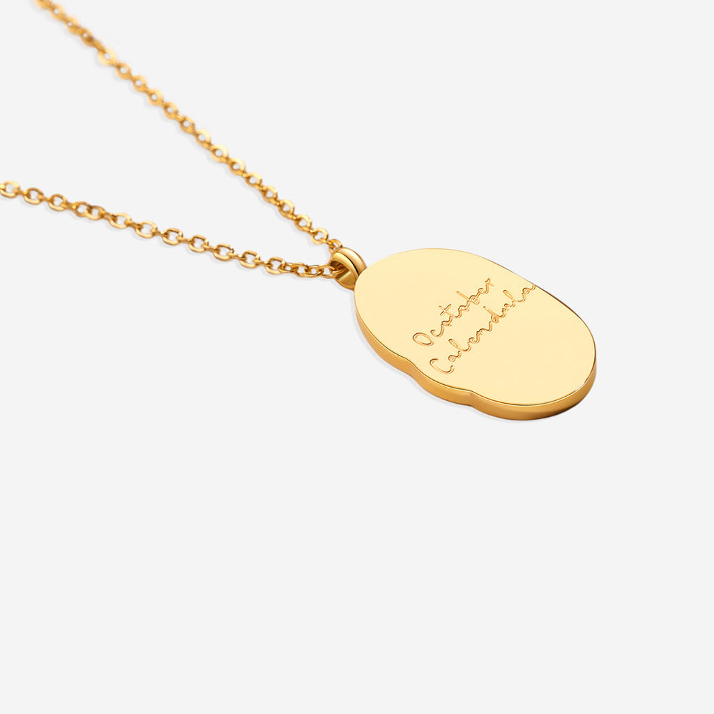 Halsband med hängsmycke i guld och födelseblomma