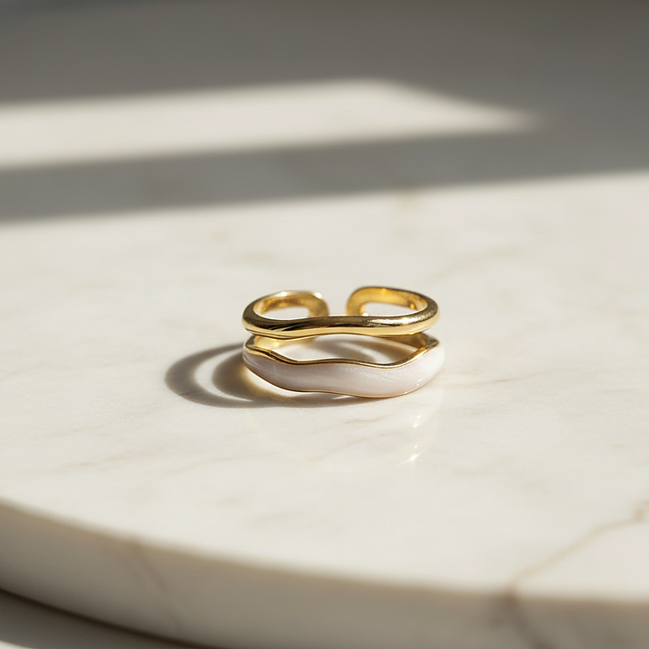 Delphine ring on marble